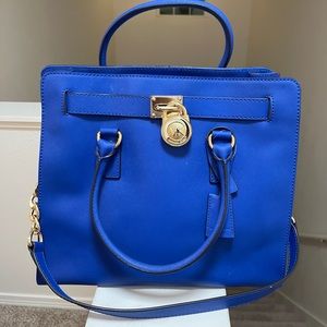 Blue Micheal Kors bag. NEVER USED. Brand new!!!! Perfect for summer!